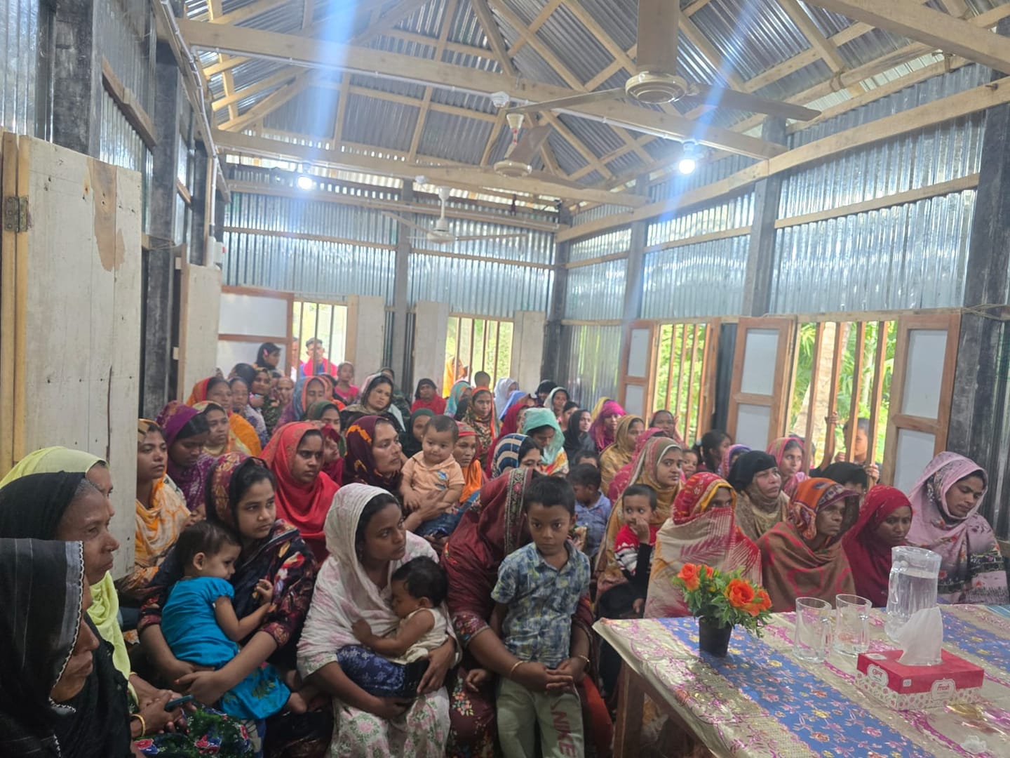 Residents at the community gathering